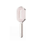 Brosse à cheveux ronde rembourrée dorée